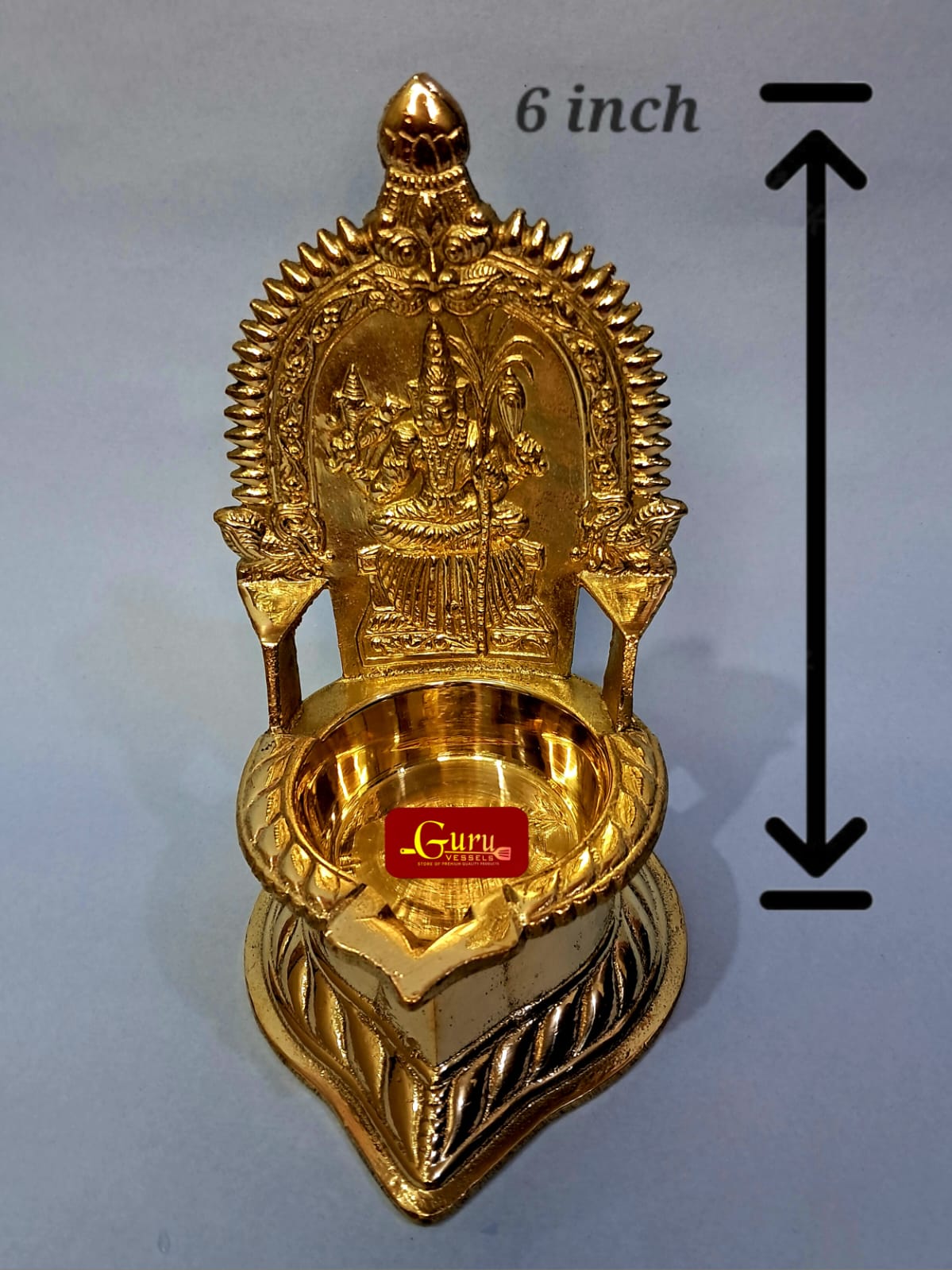 "Kamatchi Amman vilakku brass deepam karumbu design close-up"